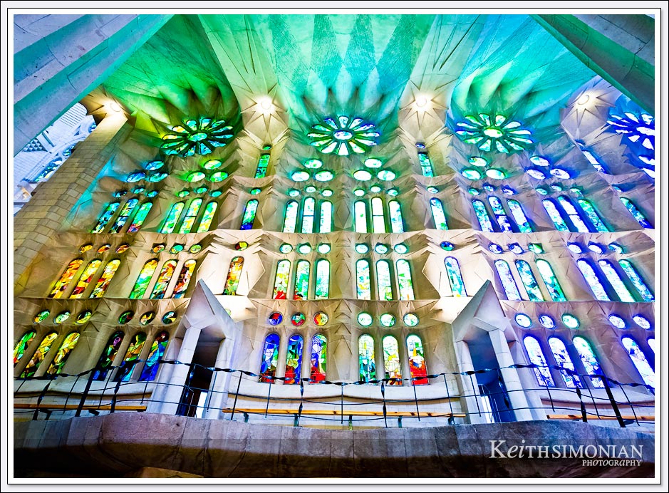 Light streaming through stained glass windows of La Sagrada Familia - Barcelona, Spain
