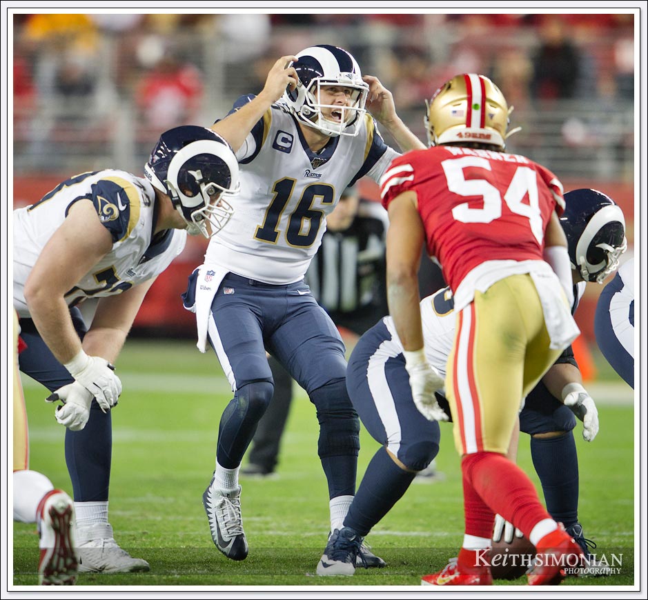 Los Angeles Ram quarterback #16 Jarad Goff calls a play at the line of scrimmage against the San Francisco 49ers at Levi's stadium.
