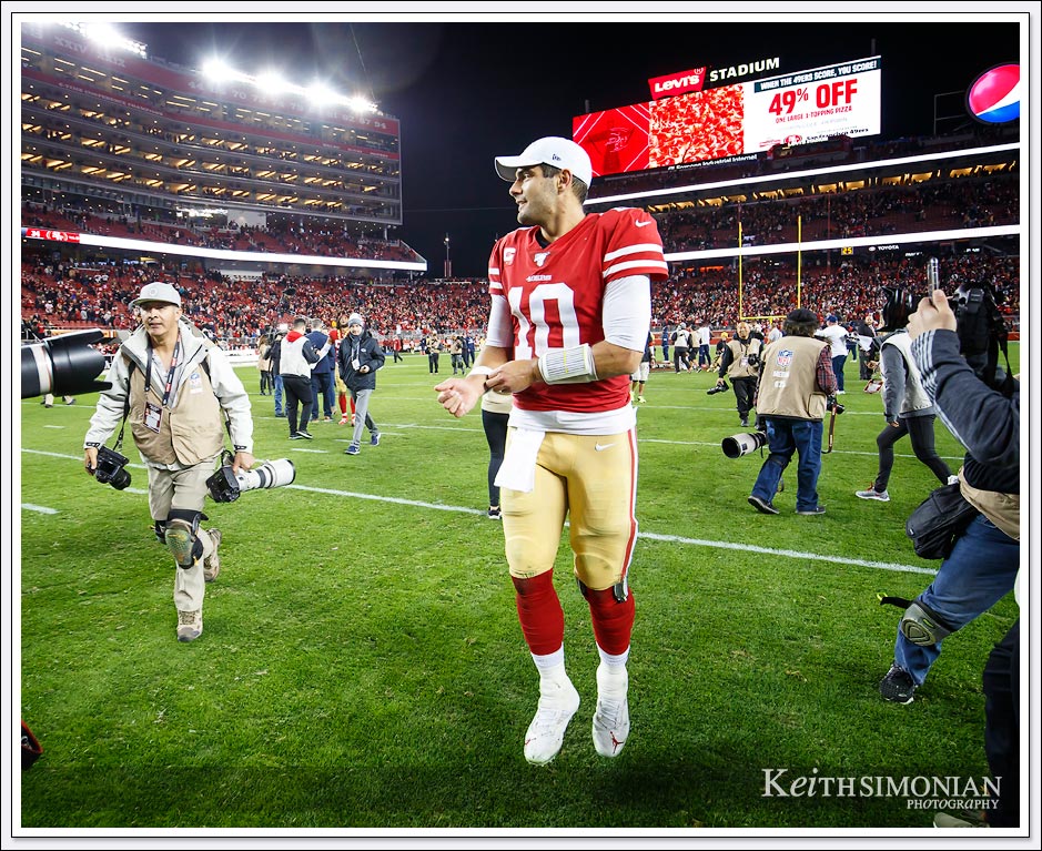 San Francisco 49er quarterback #10 Jimmy Garoppolo walks of the field after the 49ers defeat the Rams at Levi's stadium on December 21, 2019.