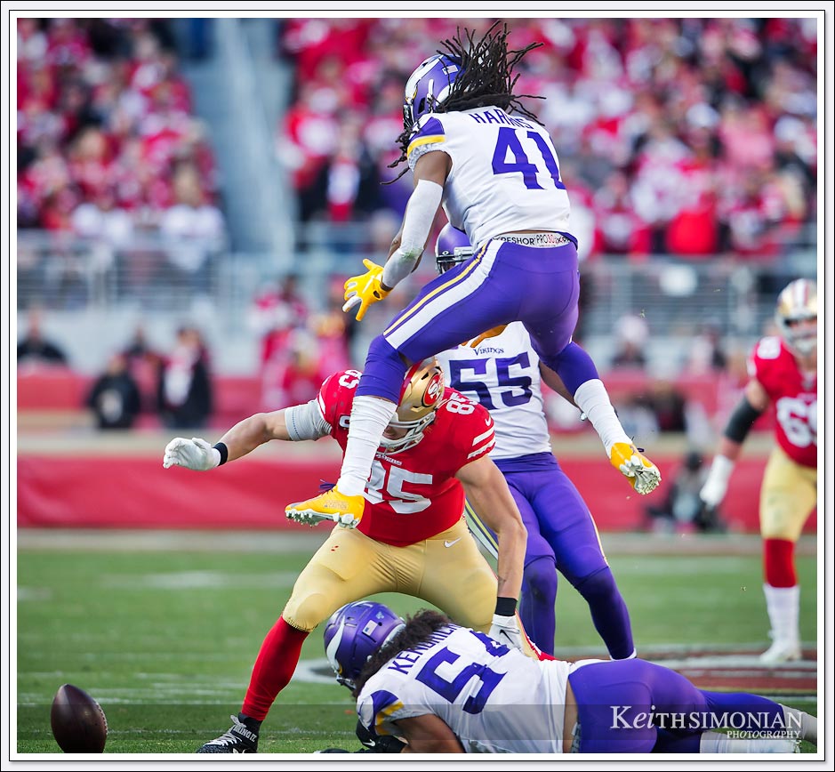 Minnesota Viking #41 Anthony Harris leaps in the air to prevent a pass reception by the 49ers during the Divisional Playoff game at Levi's Stadium in Santa Clara, California