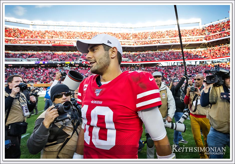 San Francisco Quarterback Jimmy Garoppolo is all smiles after defeating the Minnesota Vikings in a 2020 NFL playoff game. 