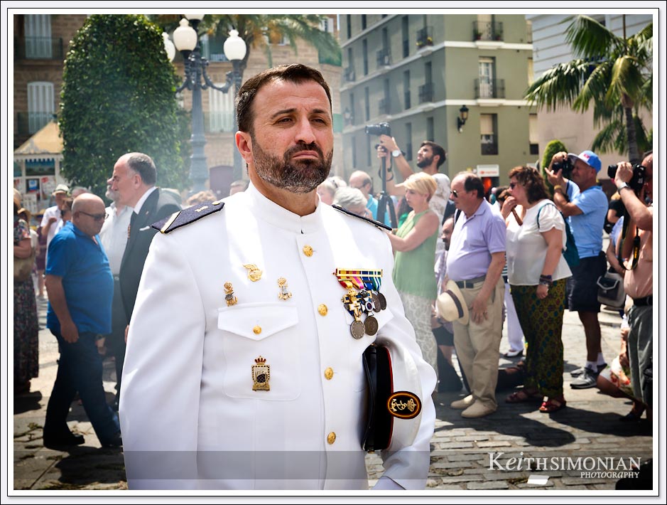Corpus Christi Festival in which this gentlemen is wearing his white uniform and medals - Cadiz, Spain.