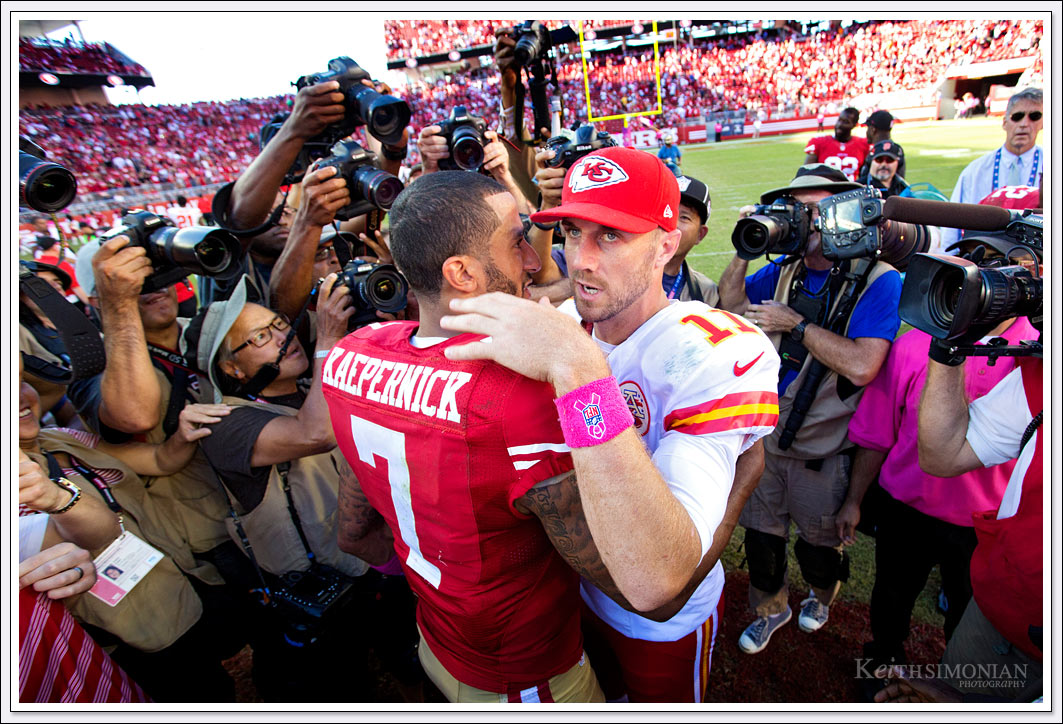 Alex Smith and Colin Kaepernick meet after the Kansas City Chiefs and San Francisco 49ers play at Levi's stadium.