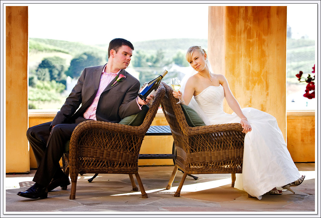 The bride and groom celebrate their wedding day with wine from the Nicholson Ranch Winery
