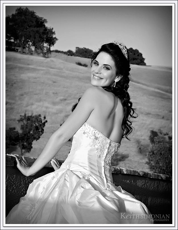 The rolling hills of the Oakhurst Country Club in Clayton, California serve as the background for this bridal portrait. 