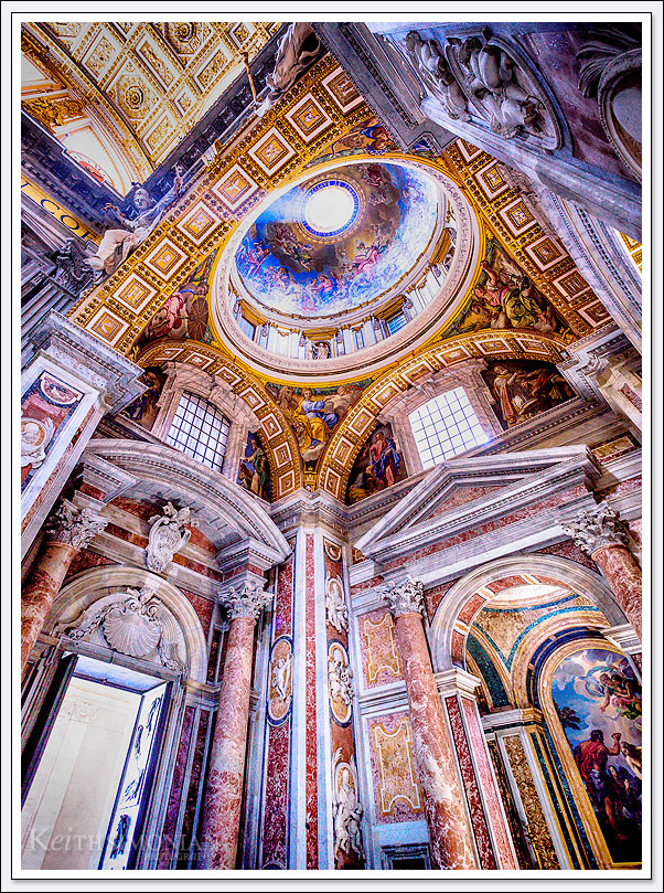 Afternoon sunlight streams through the opening in the Dome of Saint Peter's Basilica in Rome Italy - the Vatican City.