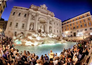 Nighttime at the Trevi Fountain in Rome Italy