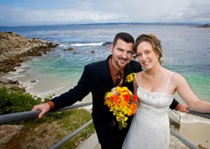 Bride and Groom pose with Pacific Ocean as backdrop - Lovers Point - Pacific Grove California