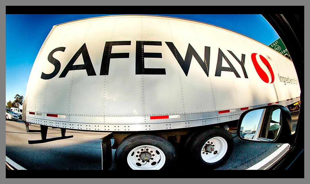 Up close and personal with a fisheye view of Safeway truck cruising down the highway.