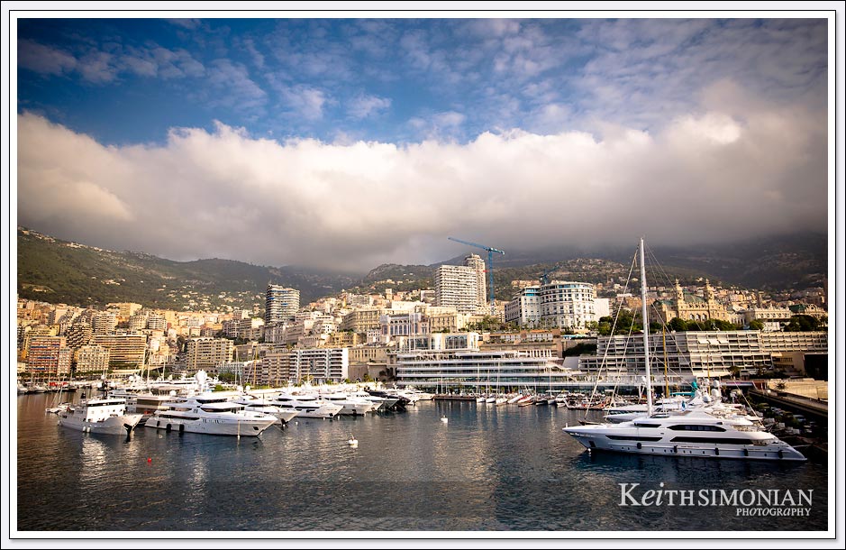 The morning fog hangs over the luxury yachts in Port Hercules - Monaco. 