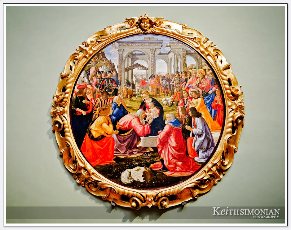 Circular painting showing the adoration of the three Kings to the baby Jesus in the arms of the Madonna - Uffizi Gallery - Florence Italy