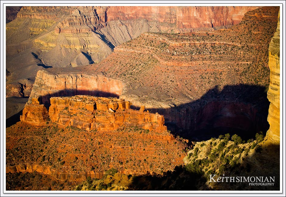 The very late sunlight shows the erosion that makes the Grand Canyon so famous. 
