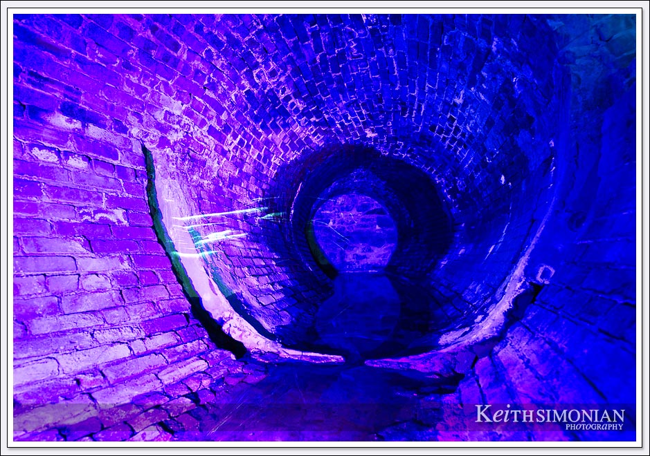 Pointe-a-Calliere, Montreal Archaeology and History Complex - Purple lit tunnel