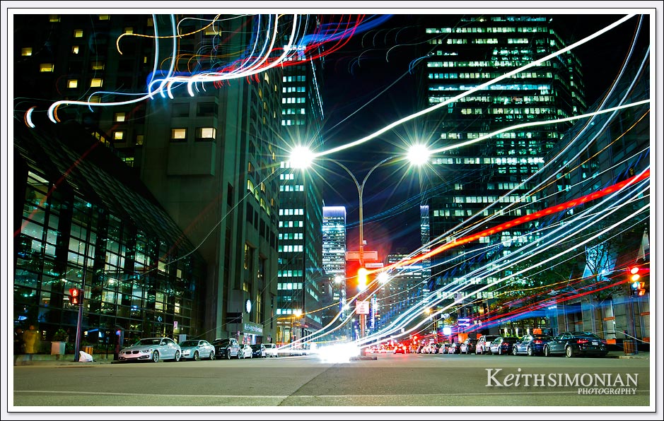 Streaks of light from cars passing by on the streets on Montreal Canada. 