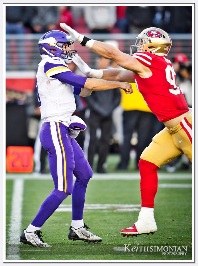Defensive End Nick Bosa in the face of Minnesota Vikings quarterback Kirk Cousins during 2020 playoff game at Levi's Stadium