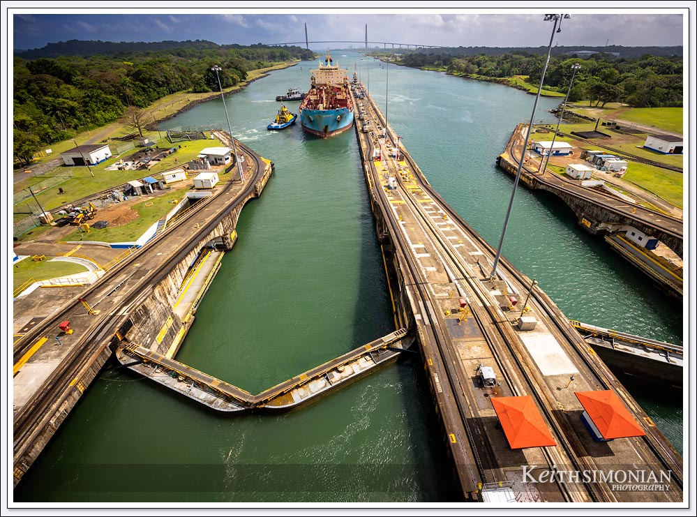 The Gatun locks of the Panama Canal with a tanker preparing to enter.